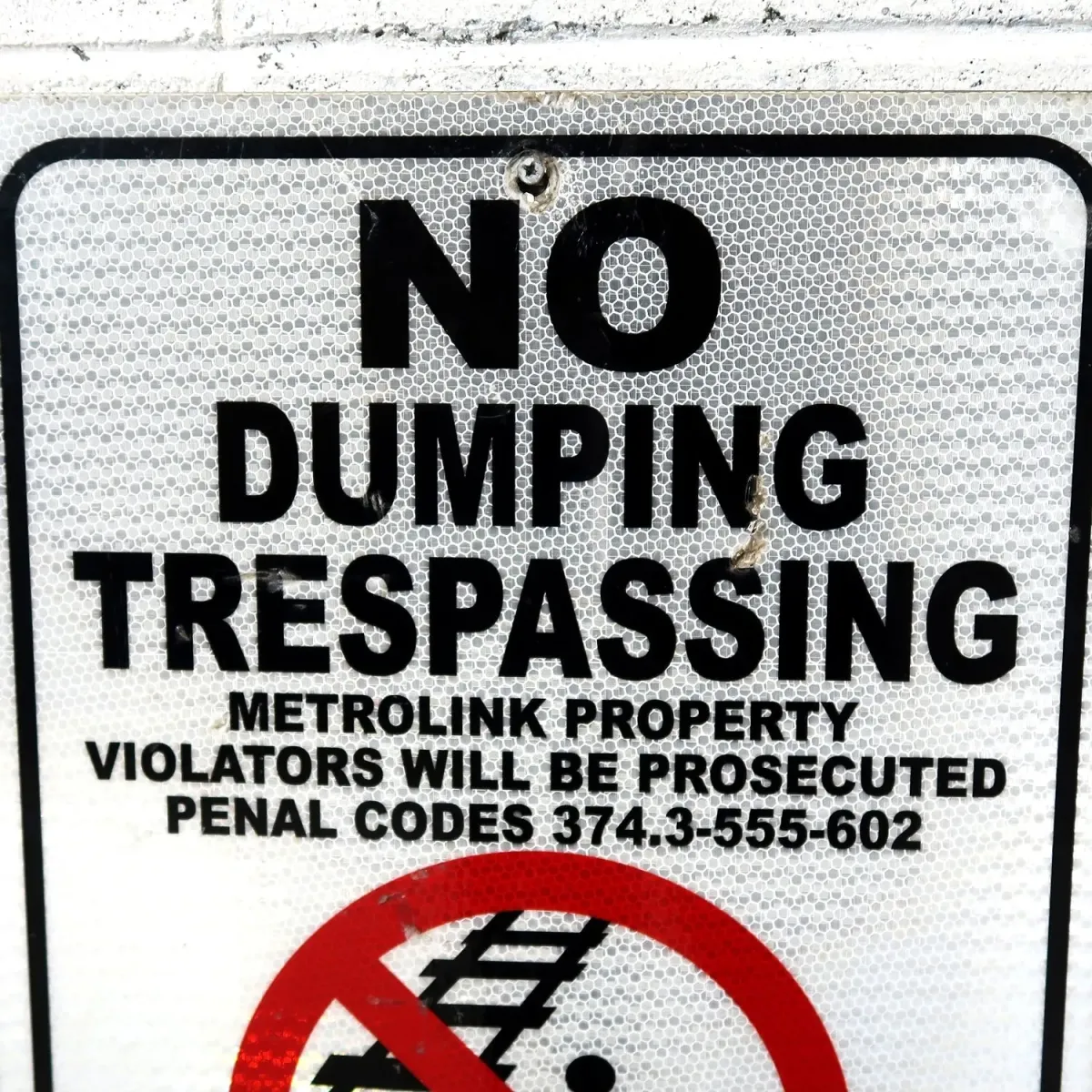 NO DUMPING TRESPASSING メタルサイン
